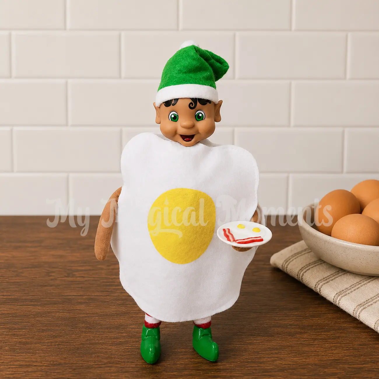 Elf holding bacon and eggs dressed as an egg