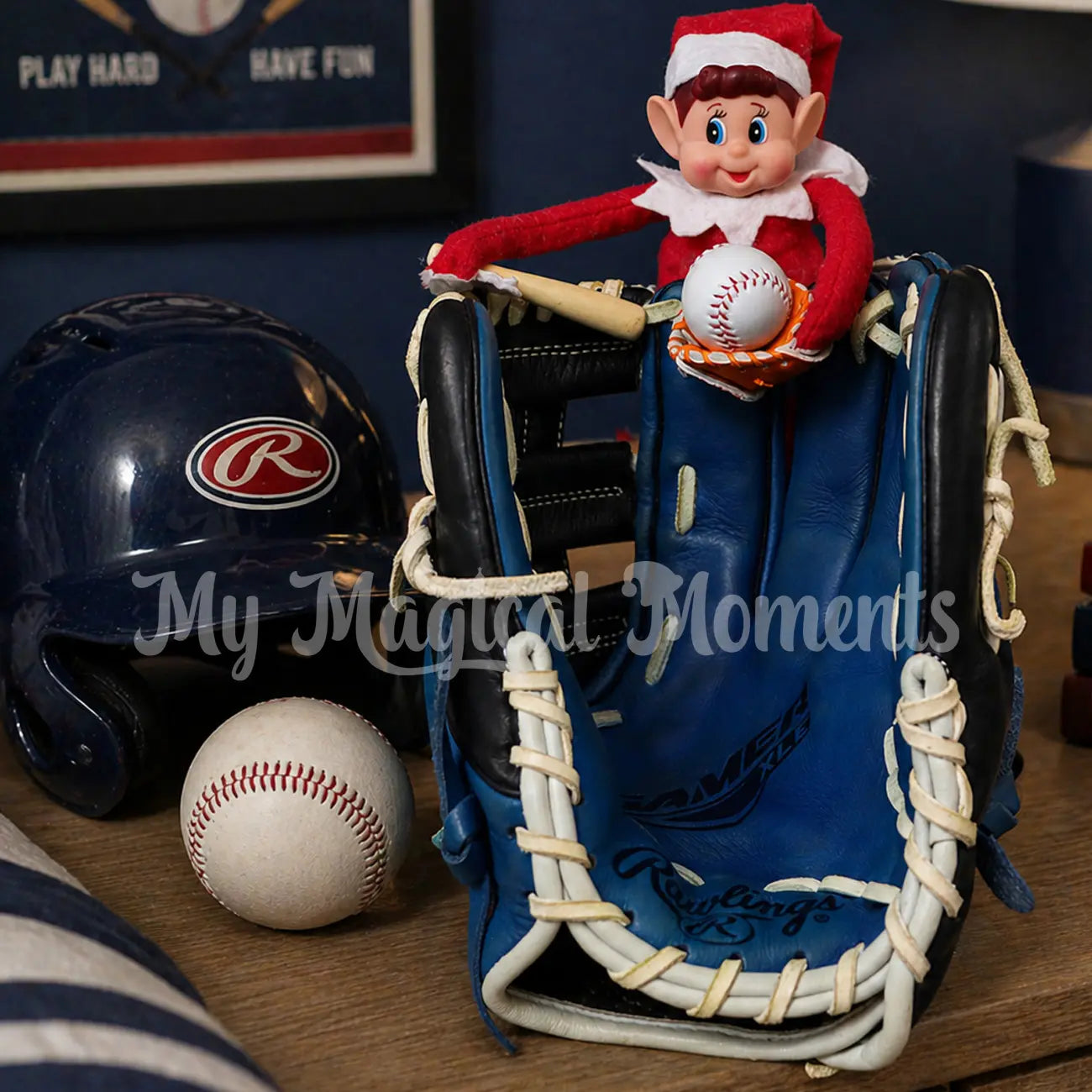 Elf on a baseball glove holding a miniature baseball glove and elf sized baseball bat