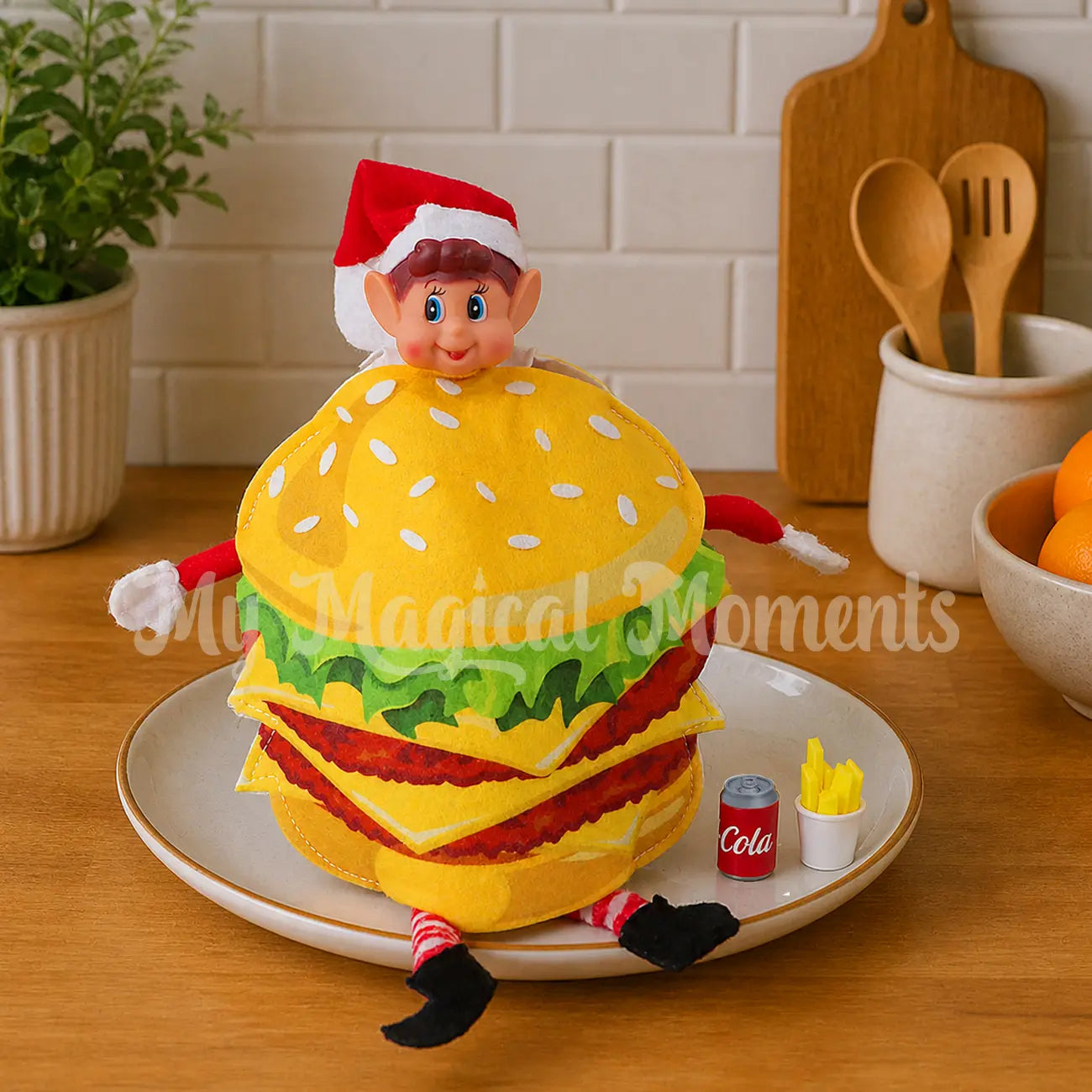 elf wearing a burger outfit with mini cola and fries