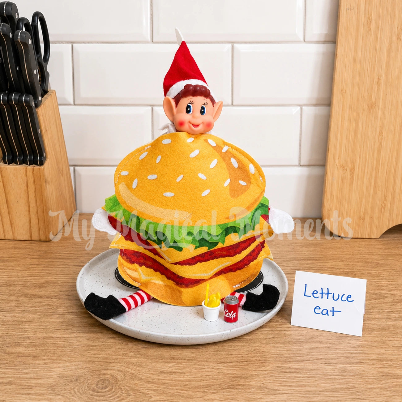 elf wearing a burger outfit with mini cola and fries