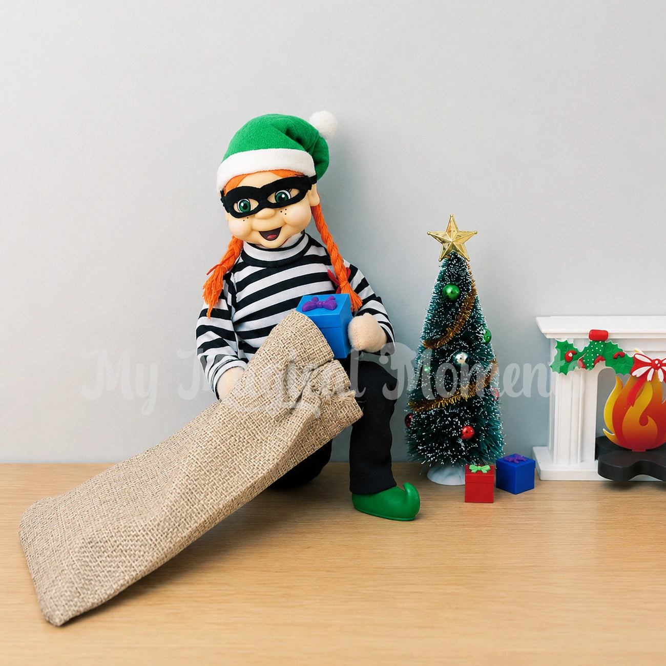 Burglar Stealing presents from under the Christmas tree and fireplace