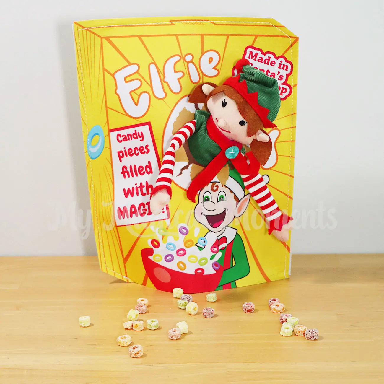 an elf for christmas girl popping out of a cereal box costume