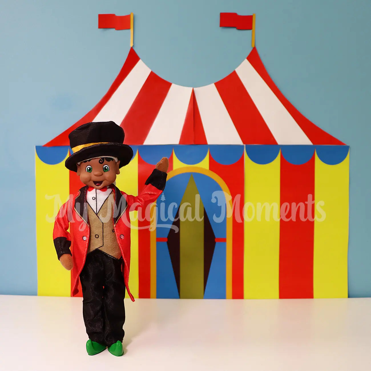 A Elf Circus tent printable with an My Elf friends black hair elf dressed as a ring leader