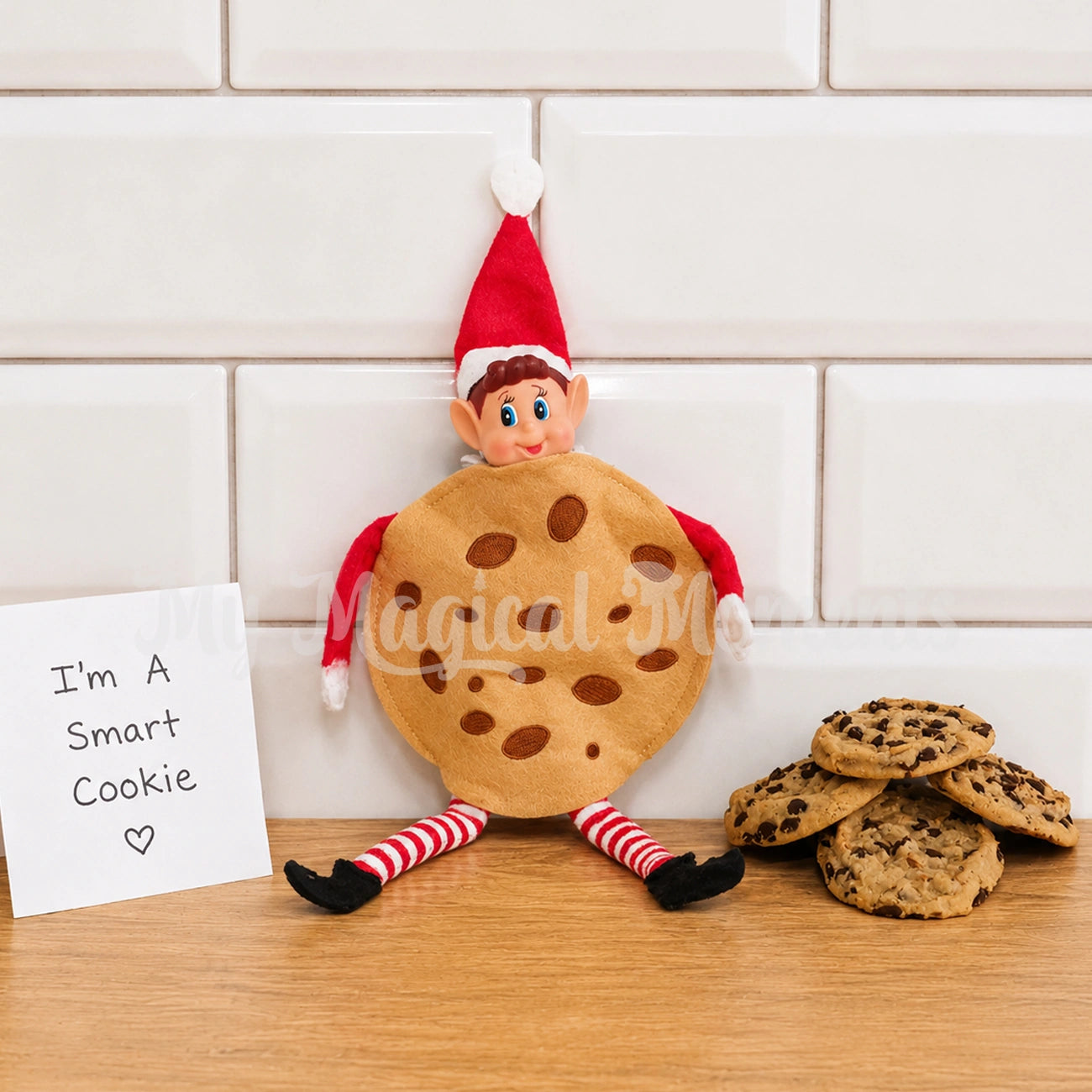 elf wearing a cookie costume with min cookies