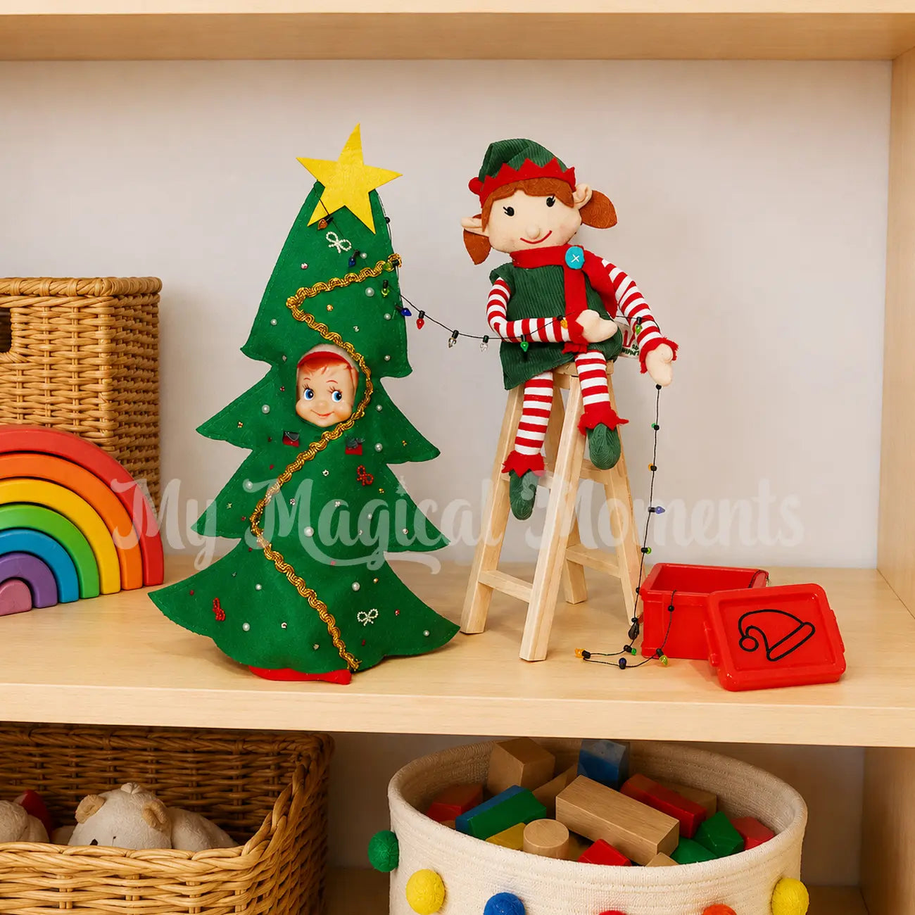 Elf wearing a Christmas tree costume with an elf for Christmas sitting on a ladder holding mini Xmas lights out of a mini container