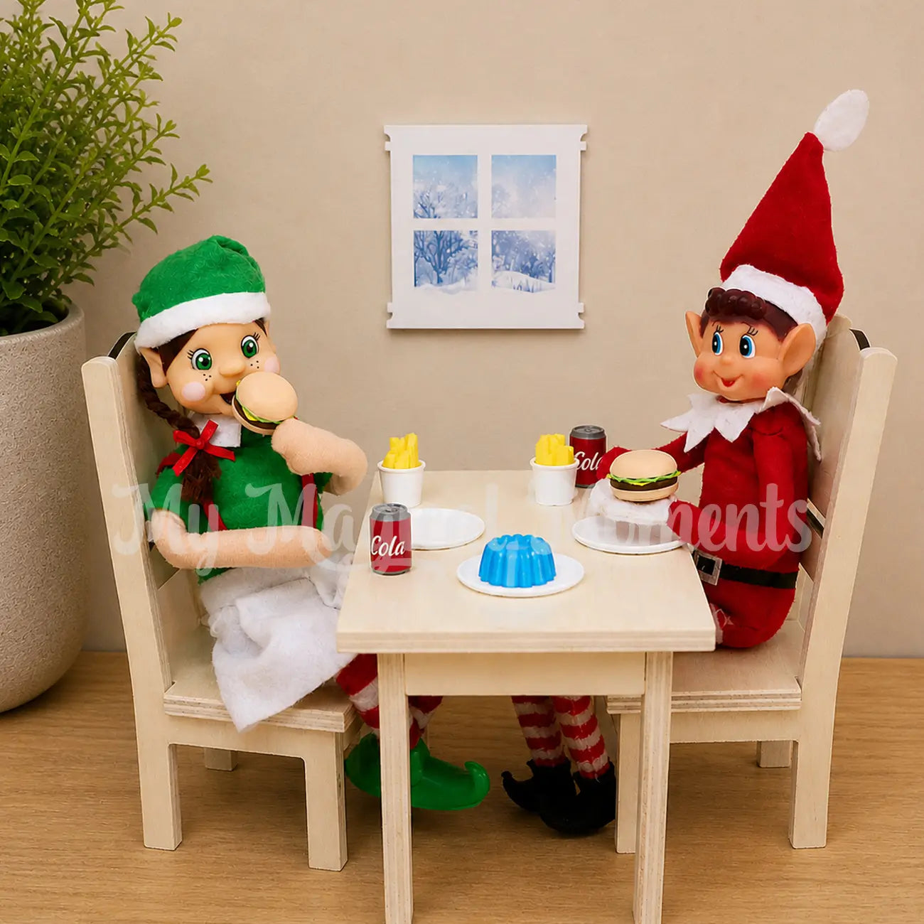 elves dining together on a miniature table and chair, with mini burgers, jelly and cola cans