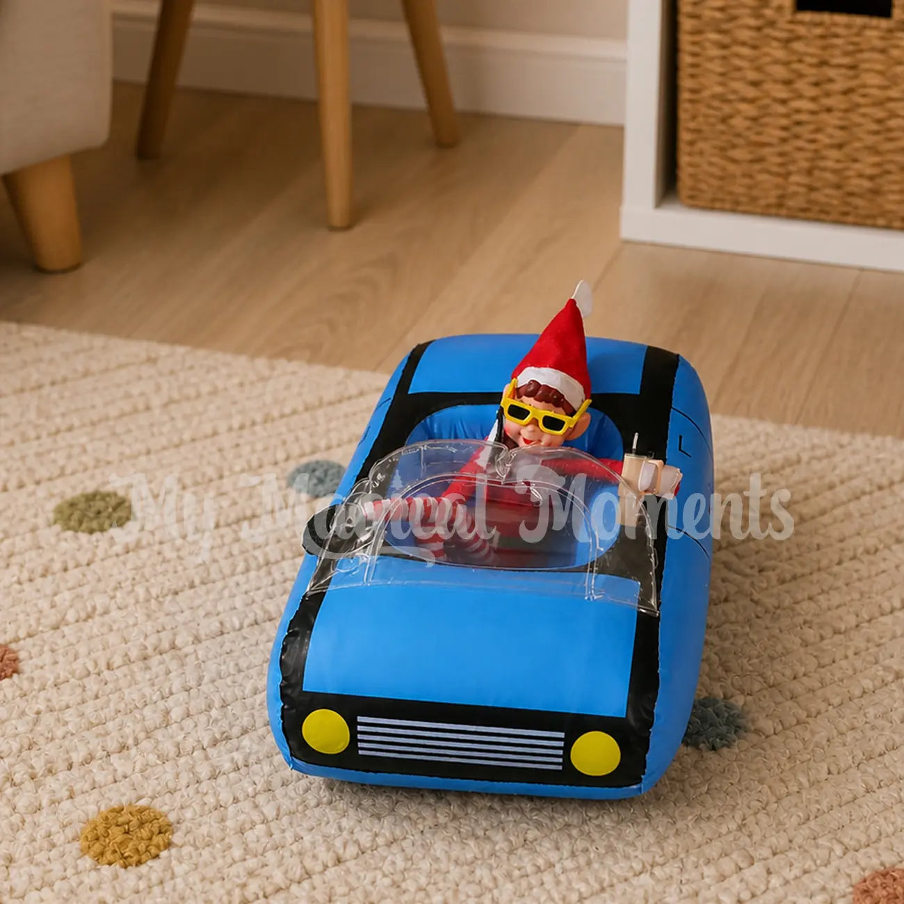 ELves behavin badly talking on a mini elf phone drinking a stanley cup in a mini car with sunglasses