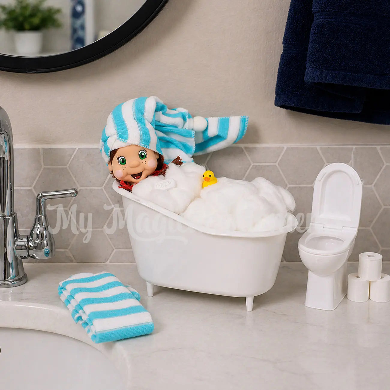My Elf Friends Brown Hair Girl With A towel on her head having a bath with her rubber ducky, and bar of soap There is a mini toilet and toilet rolls