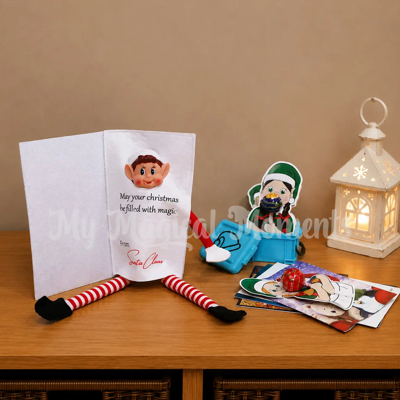 Elf Wearing a Card costume with Christmas gifts, lollipop elf holders in a container