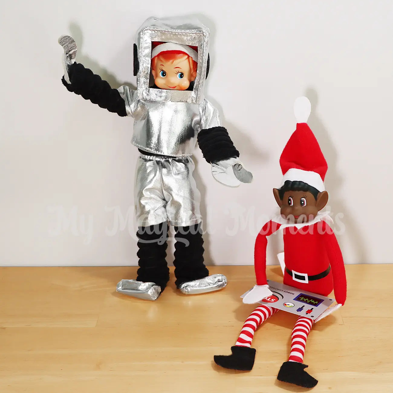 Elf wearing a robot outfit being controlled by a elves behavin badly