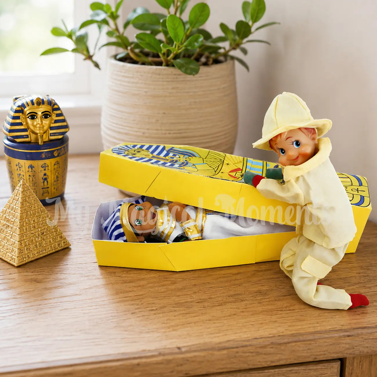 Elf wearing a archeologist costume finding an ancient Egyptian tomb