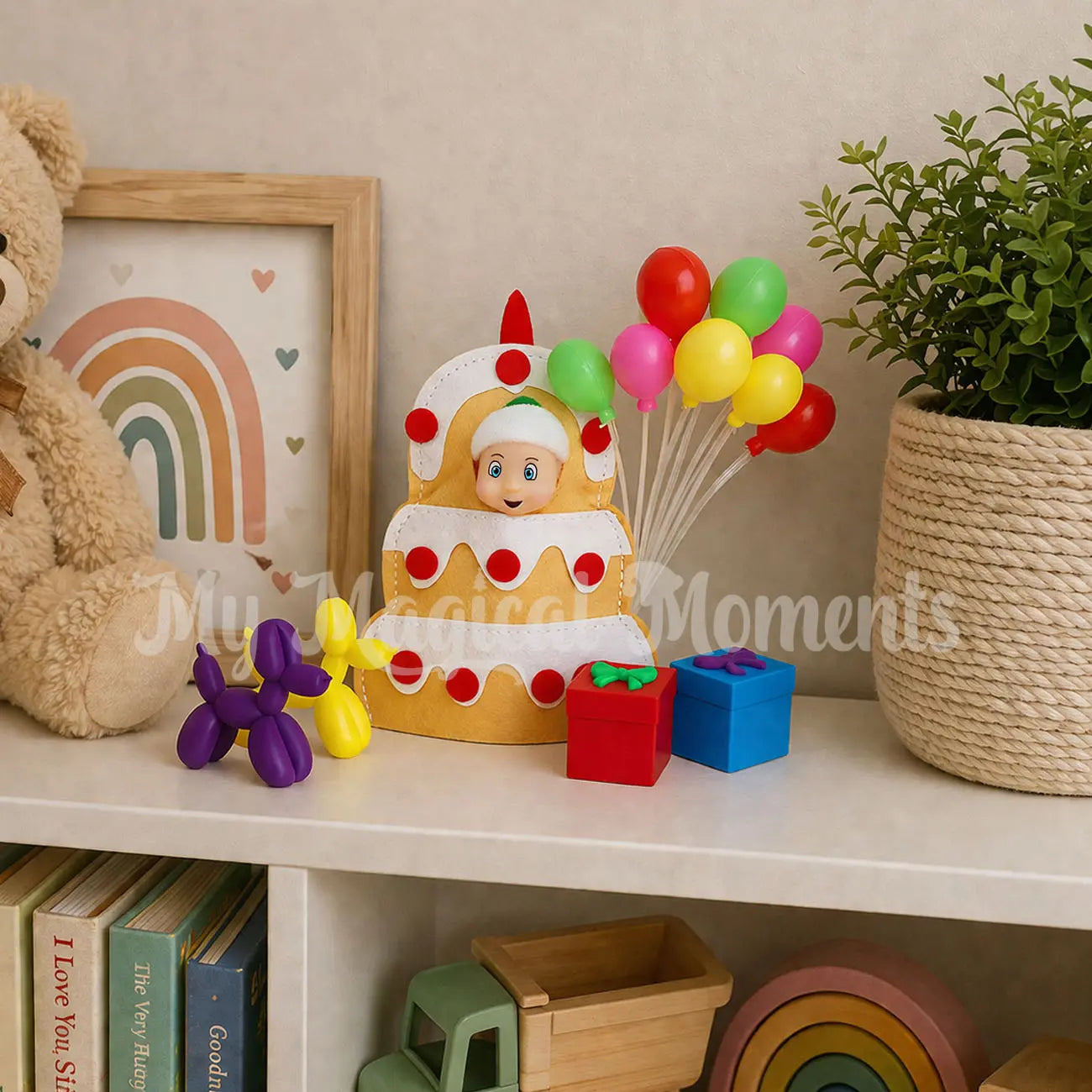 Elf baby wearing a cake costume celebrating a birthday