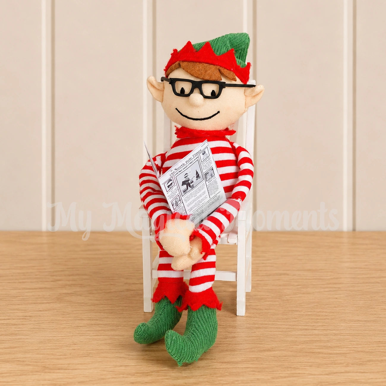 elf reading a Newspaper with glasses