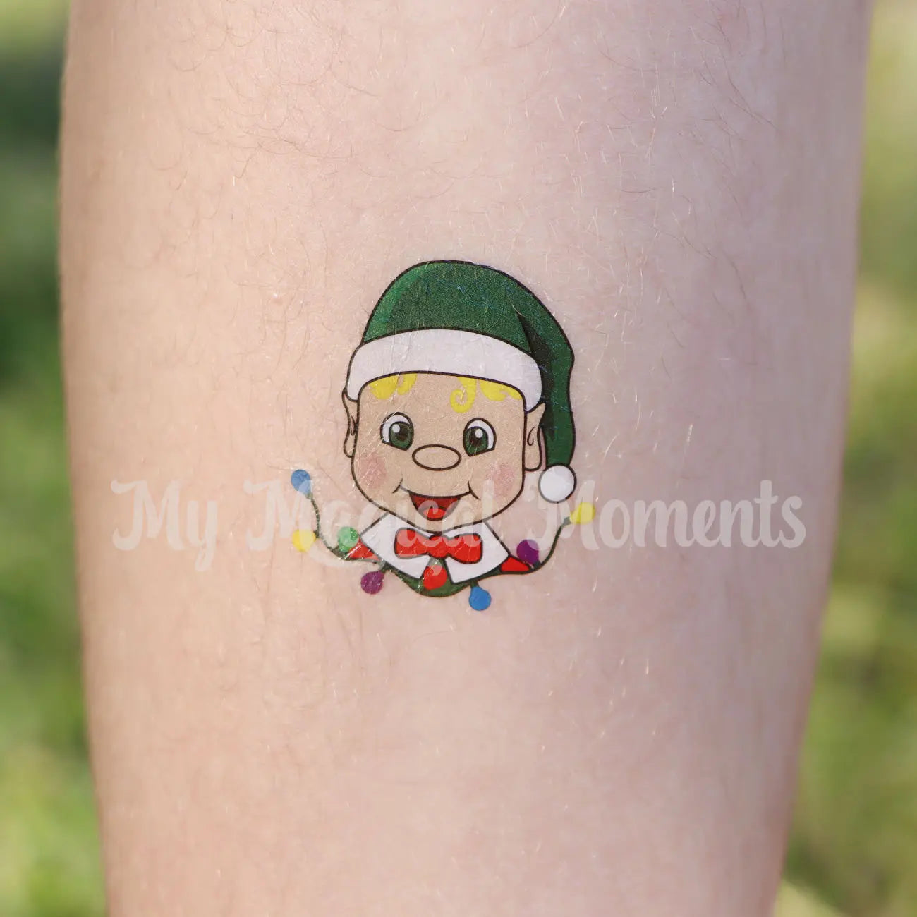Blonde Hair My Elf Friends Temporary tattoo on a childs leg