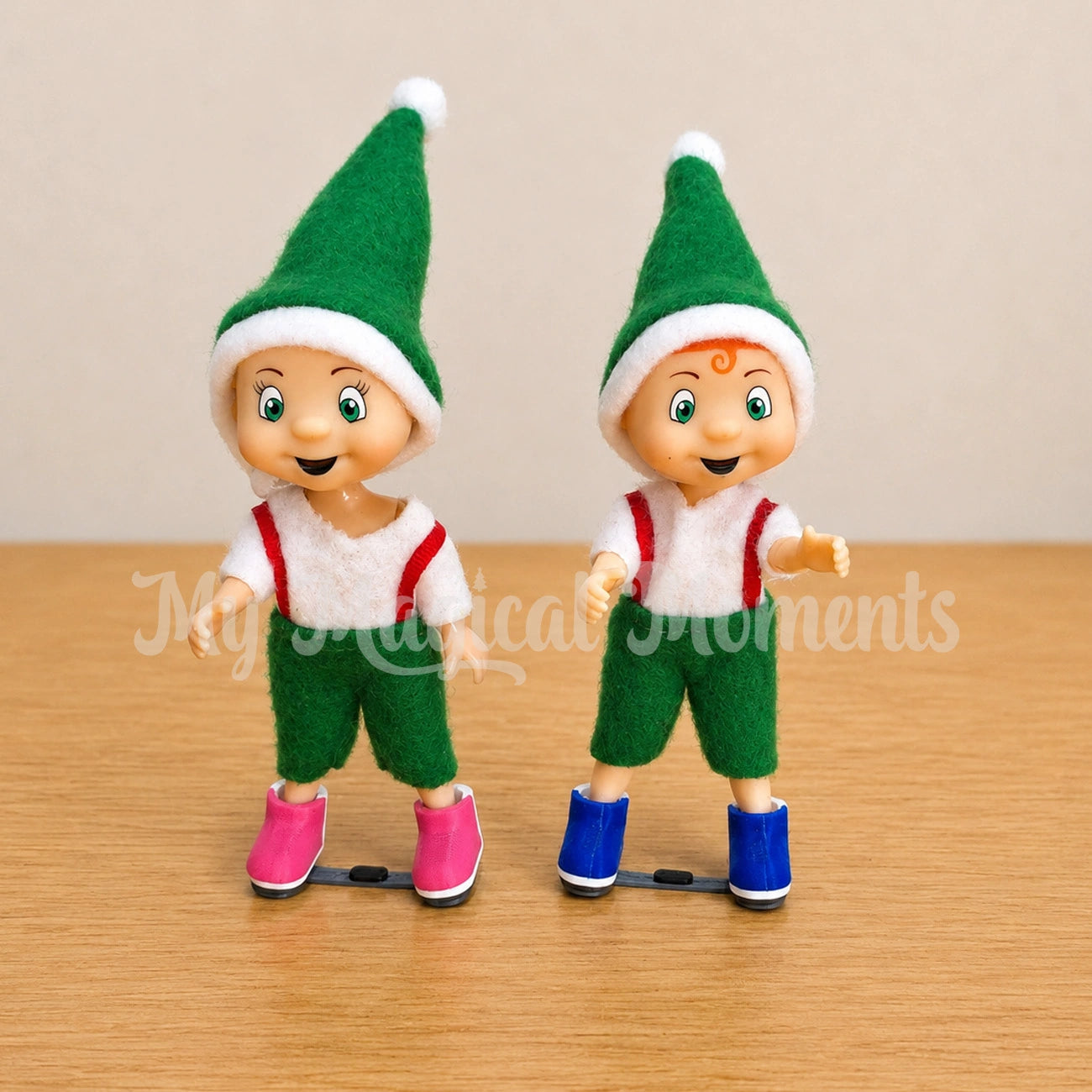 Toddler elves wearing ponseti boots