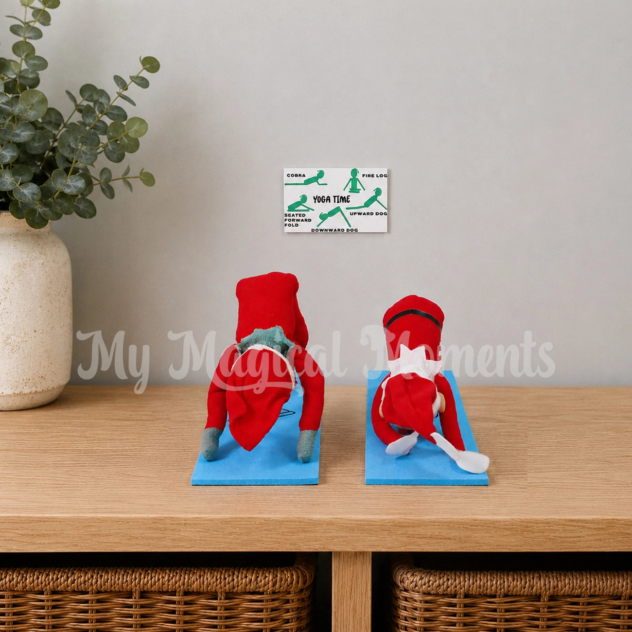 Elves doing yoga poses on an mini yoga mat