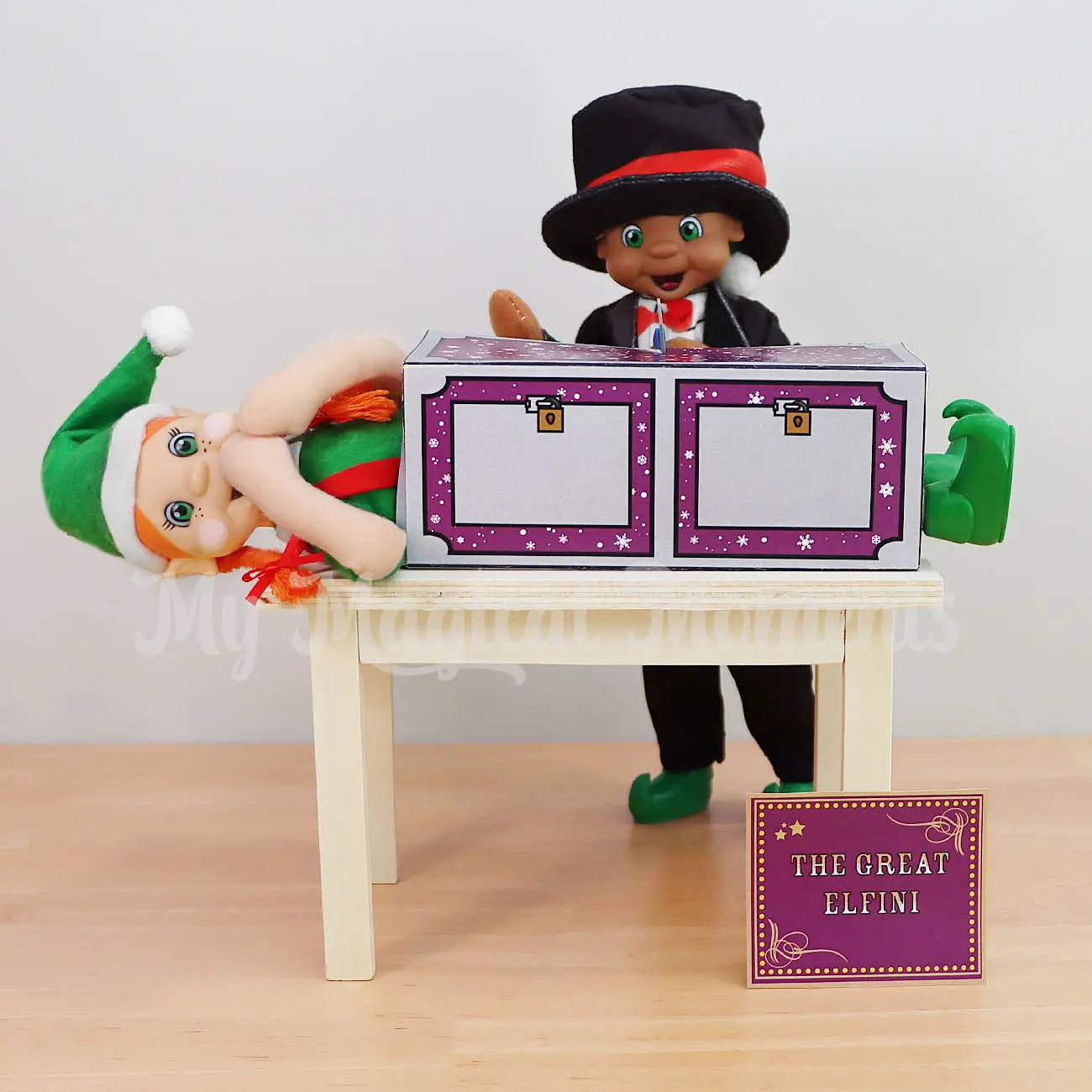 My Elf Friends Black Hair Elf dressed as a magician sawing an elf in half