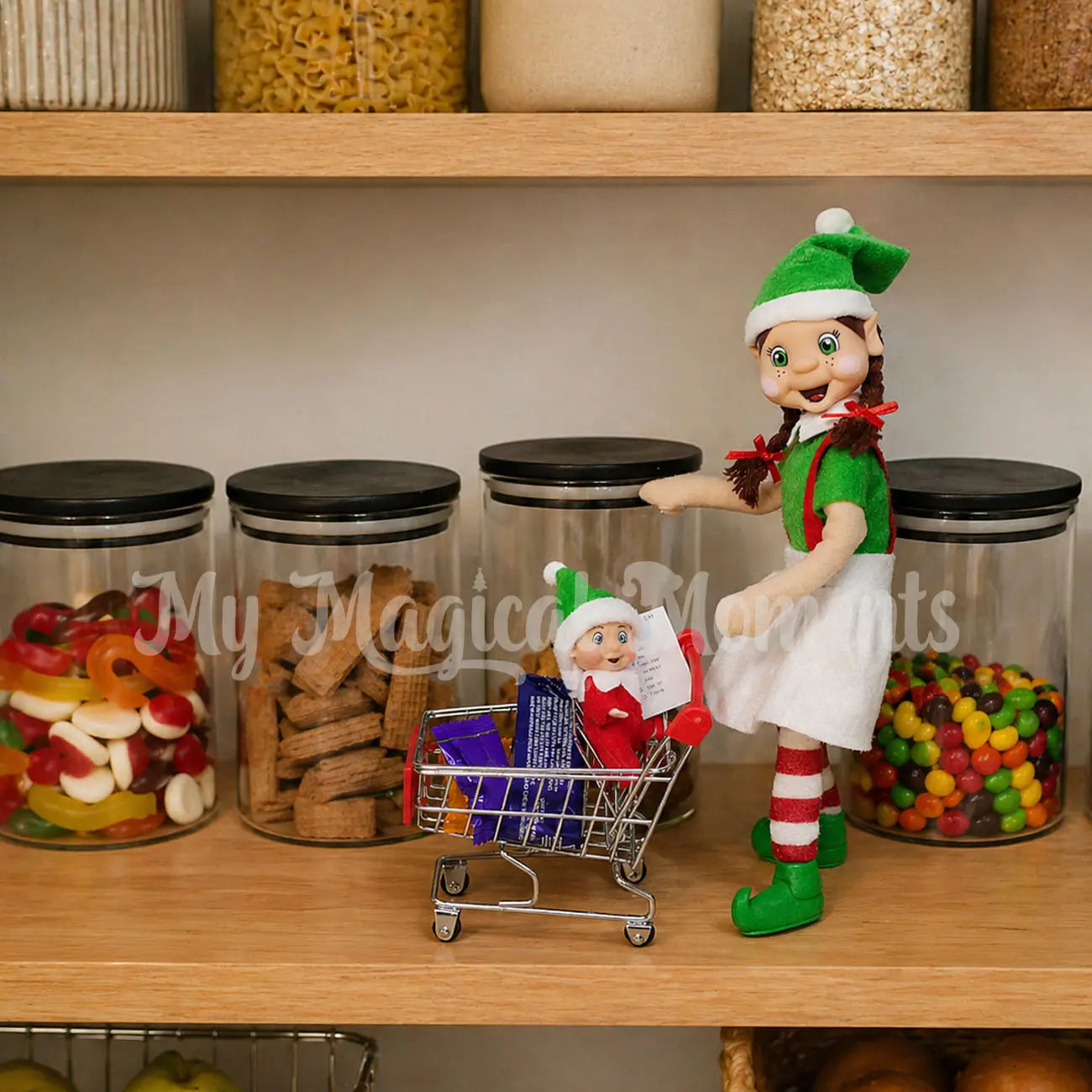elf shopping in the cupboard with elf baby for food