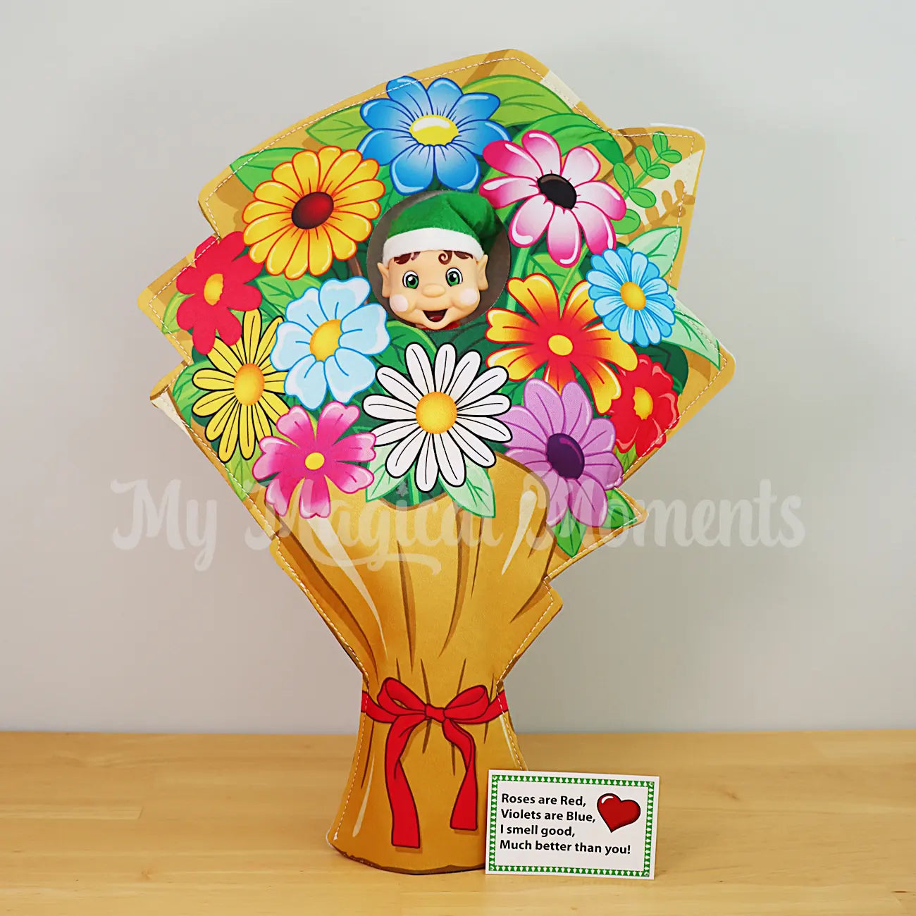 My Elf Friends Brown hair bendable elf wearing a bouquet of flowers costume