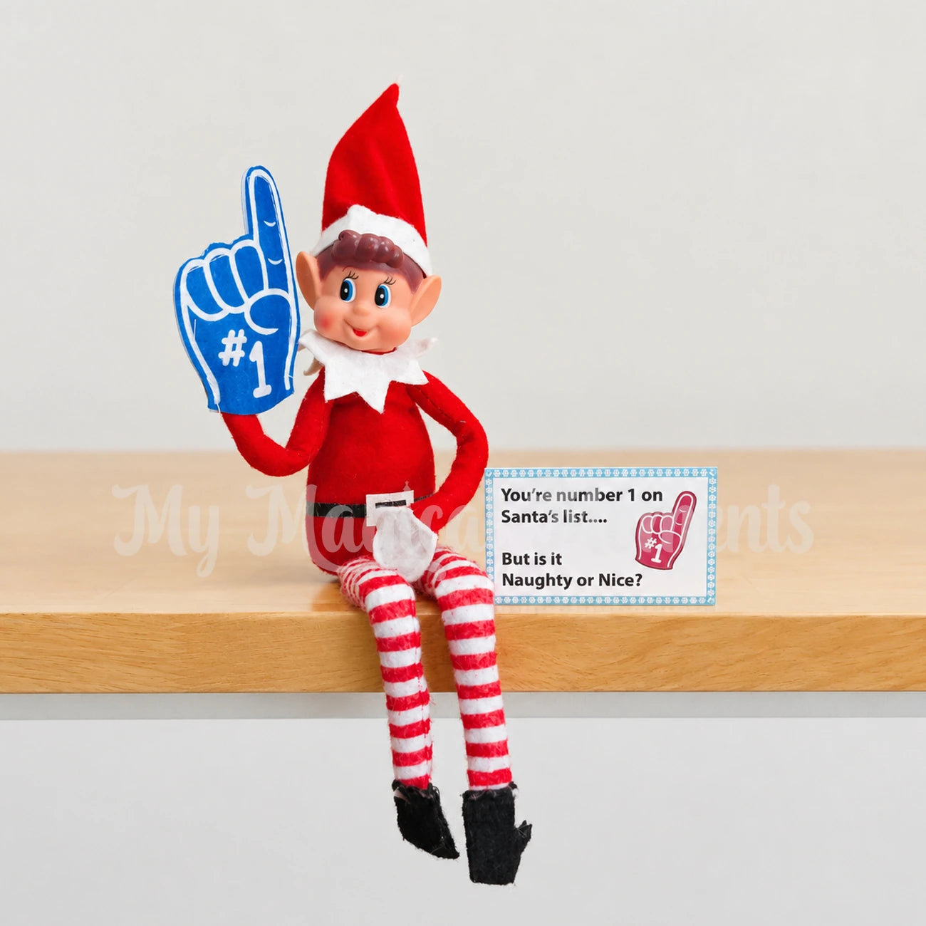 Elf With a foam finger next to a sign saying you're number 1 on Santa's list