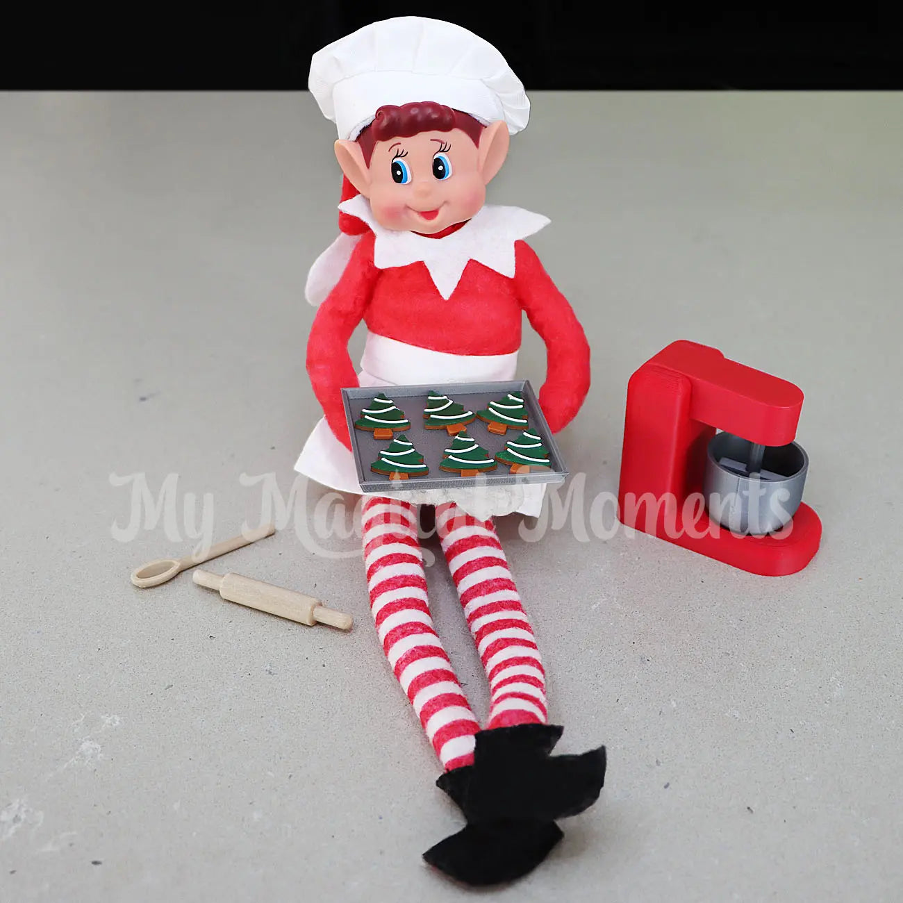 Elf With mini tray of gingerbread Tree cookies and baking set with chef outfit