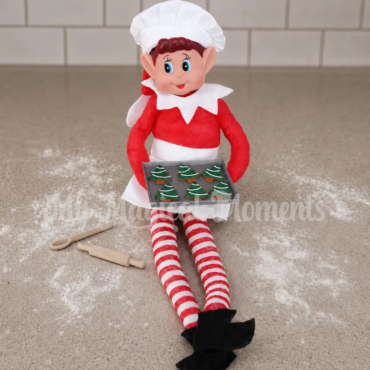 Elf With mini tray of gingerbread Tree cookies and baking set with chef outfit