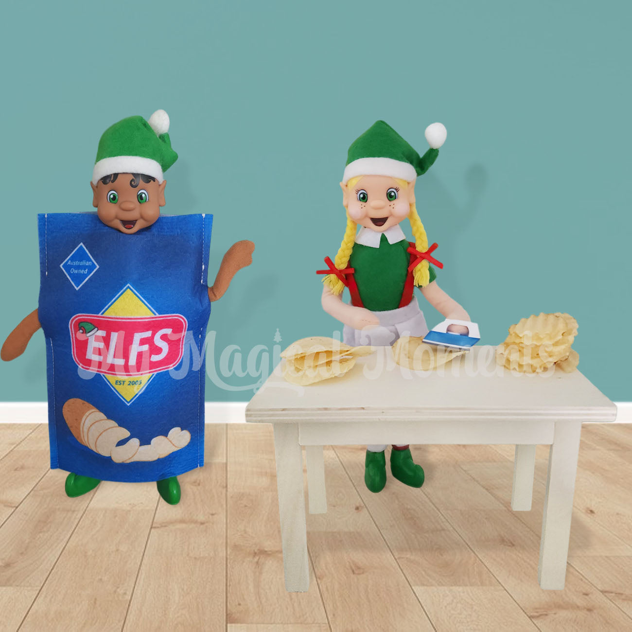 elves ironing chips with an elf dressed a bag of chips