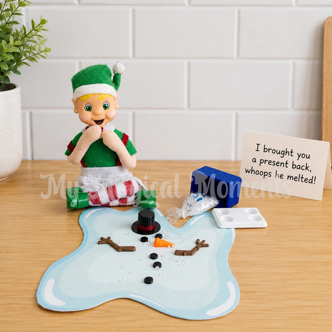 Elf In the kitchen with melting snowman prop