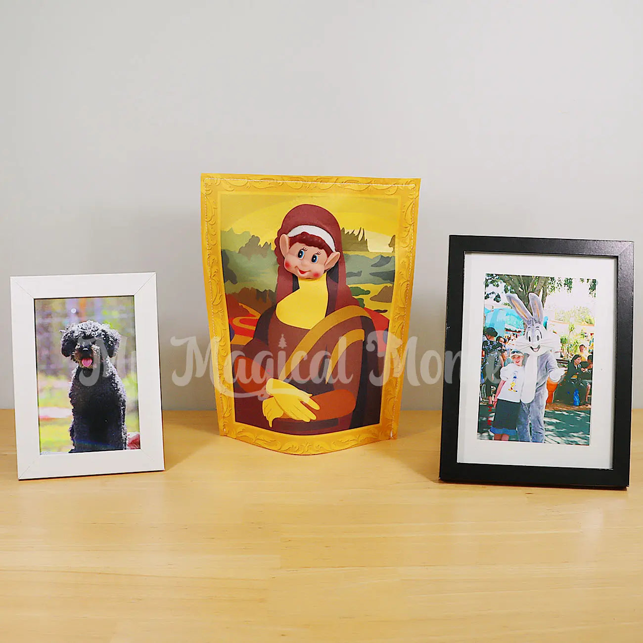 Elves Behavin Badly wearing a Mona List Costume amongst Family photos frames