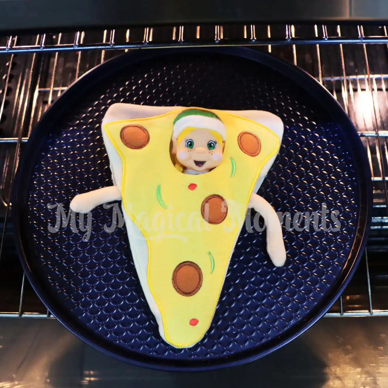 Elf wearing a pizza costume in the oven