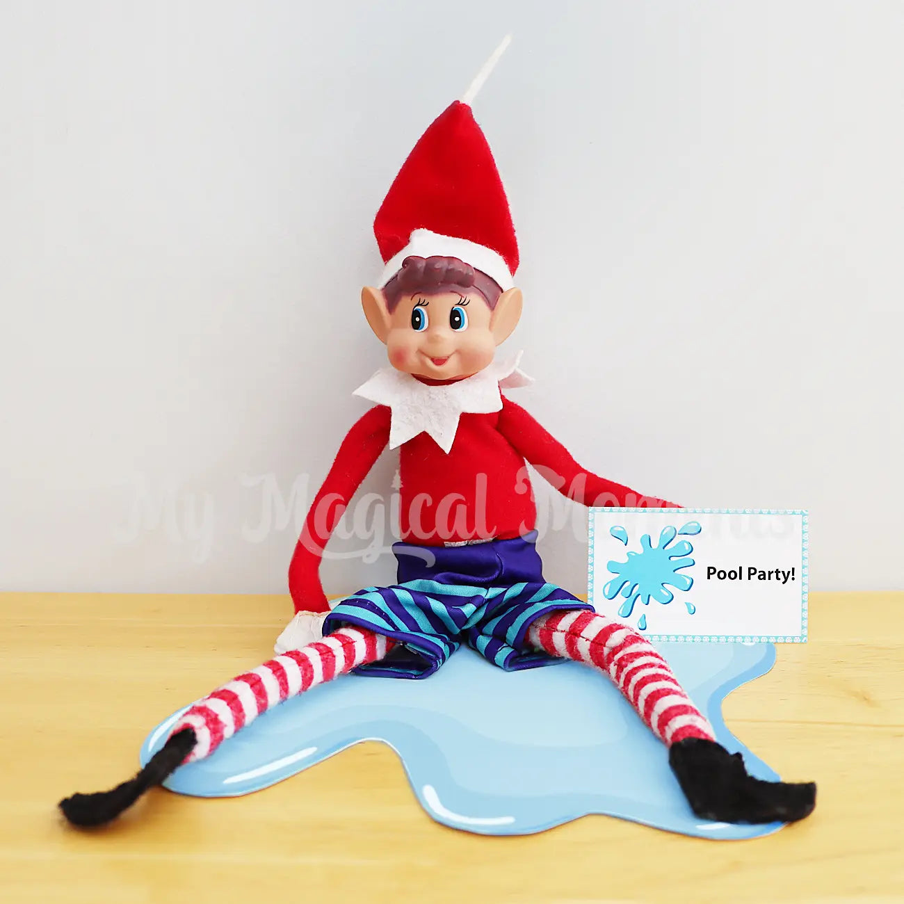 Elves behavin badly wearing boardies having a pool party