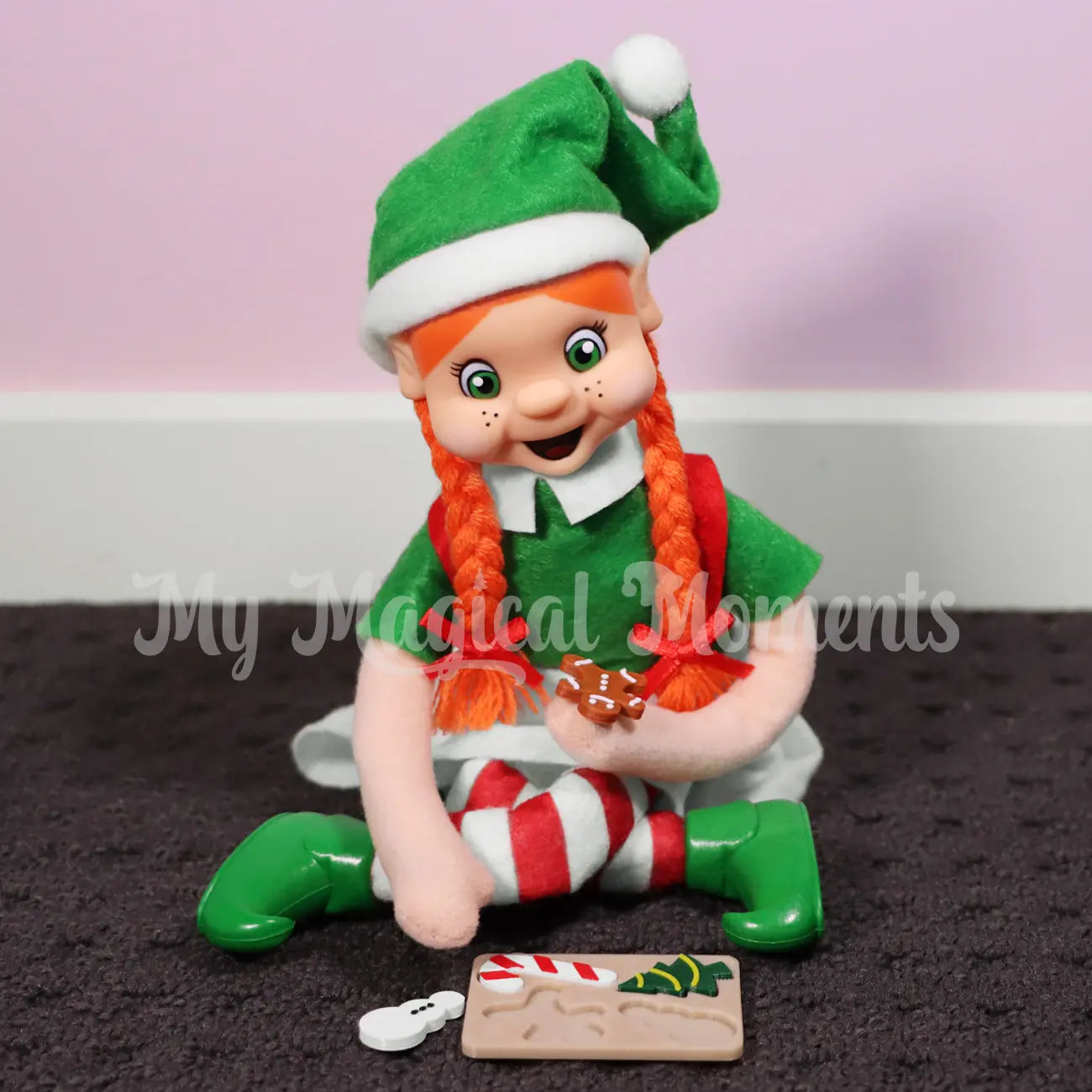Orange hair girl elf doing a puzzle prop on the floor