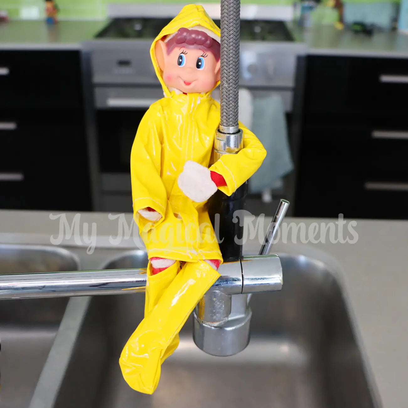 Elf wearing a rain jacket and gumboots in the sink
