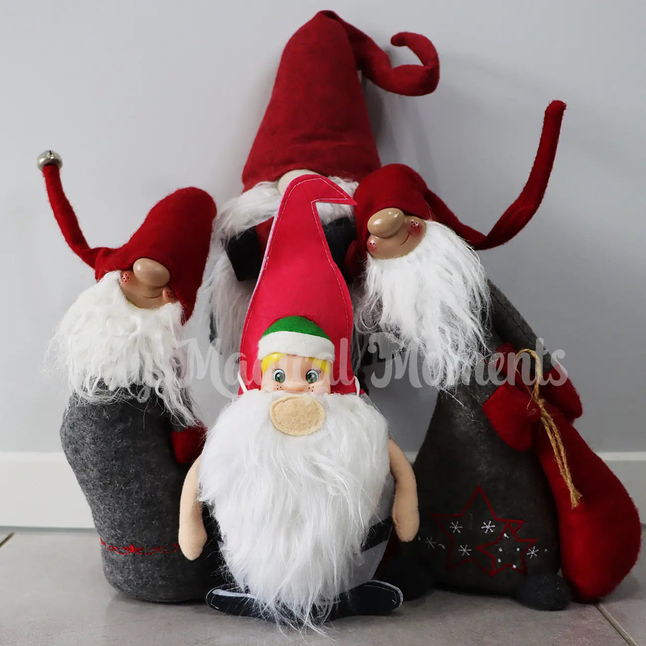 An elf dressed as santa gnome hiding in ornaments