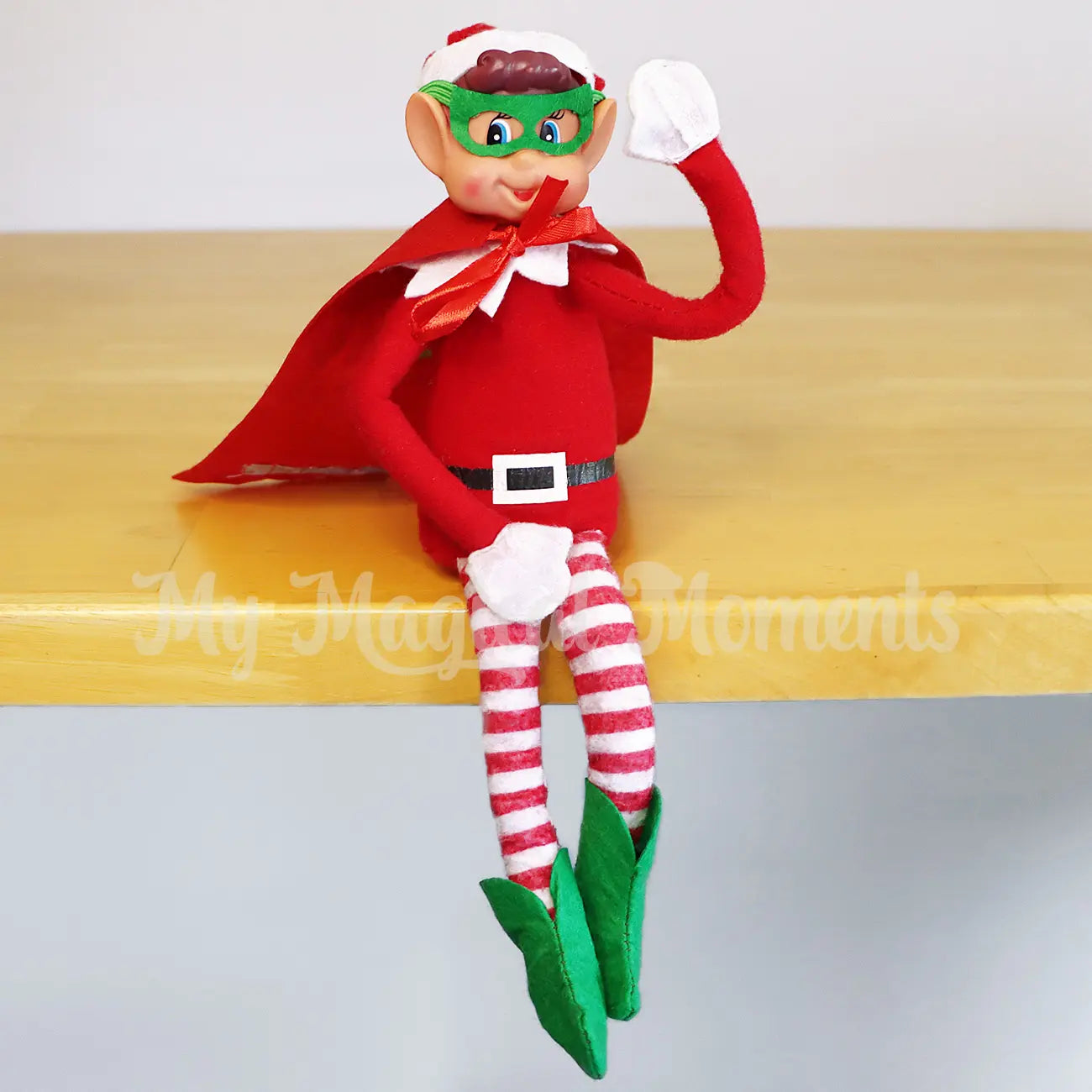 Elf wearing a superhero costume