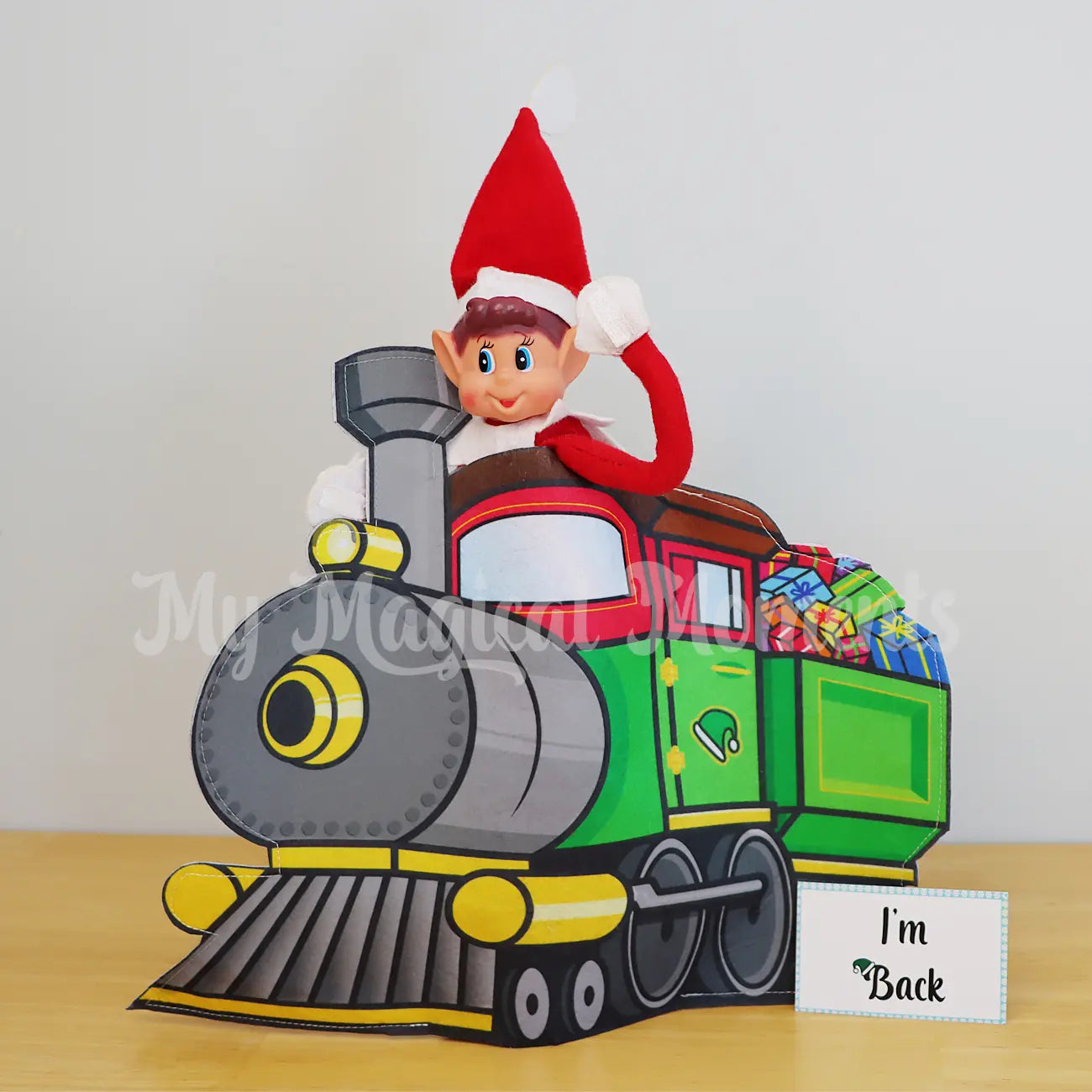 Elf back with train elf costume