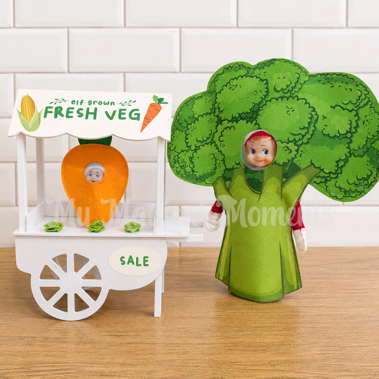 Elf dressed as a broccoli selling vegetables from their mini shop