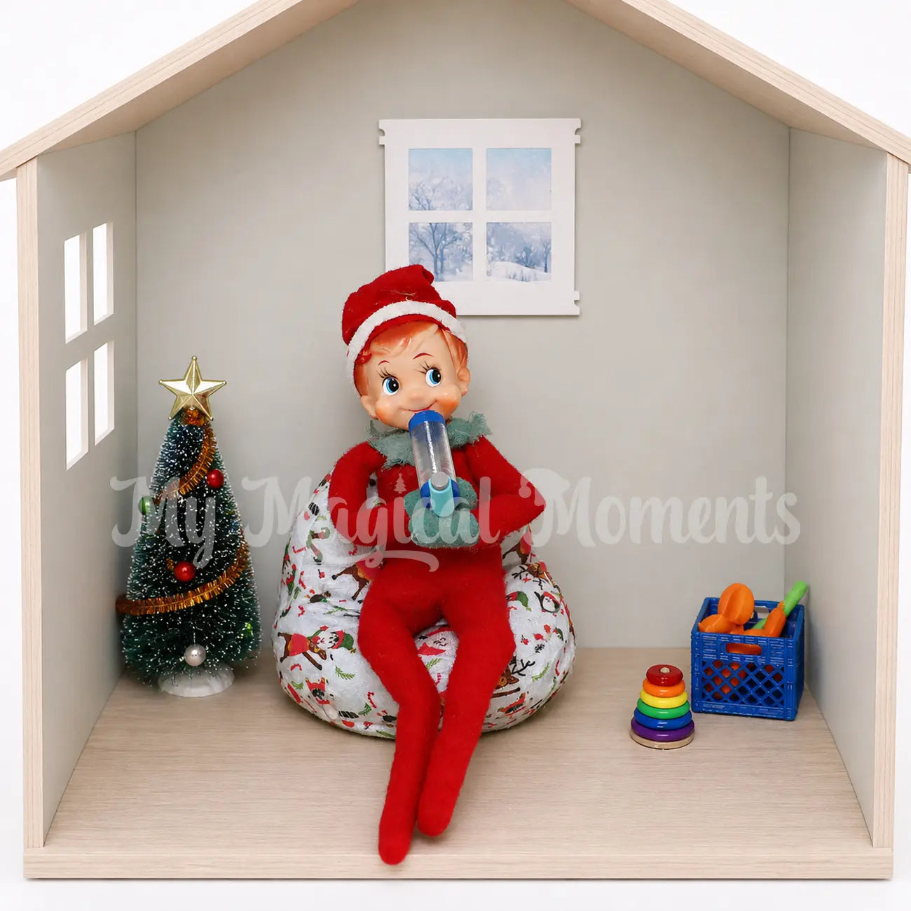 Vintage elf using a miniature elf puffer in a room with a Christmas tree and elf props