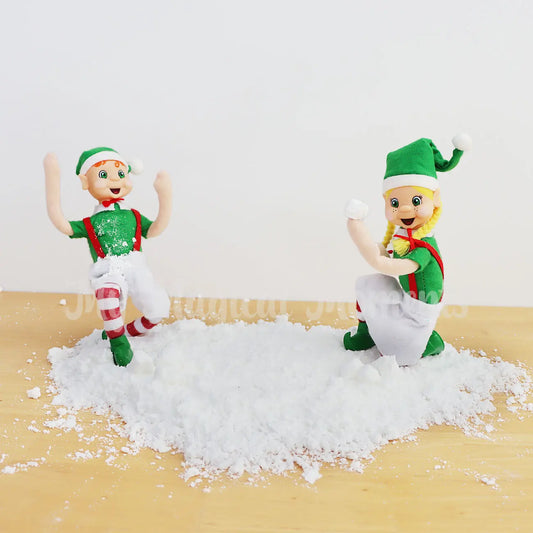 My Elf Friends Playing in fake snow  having an elf snowball fight