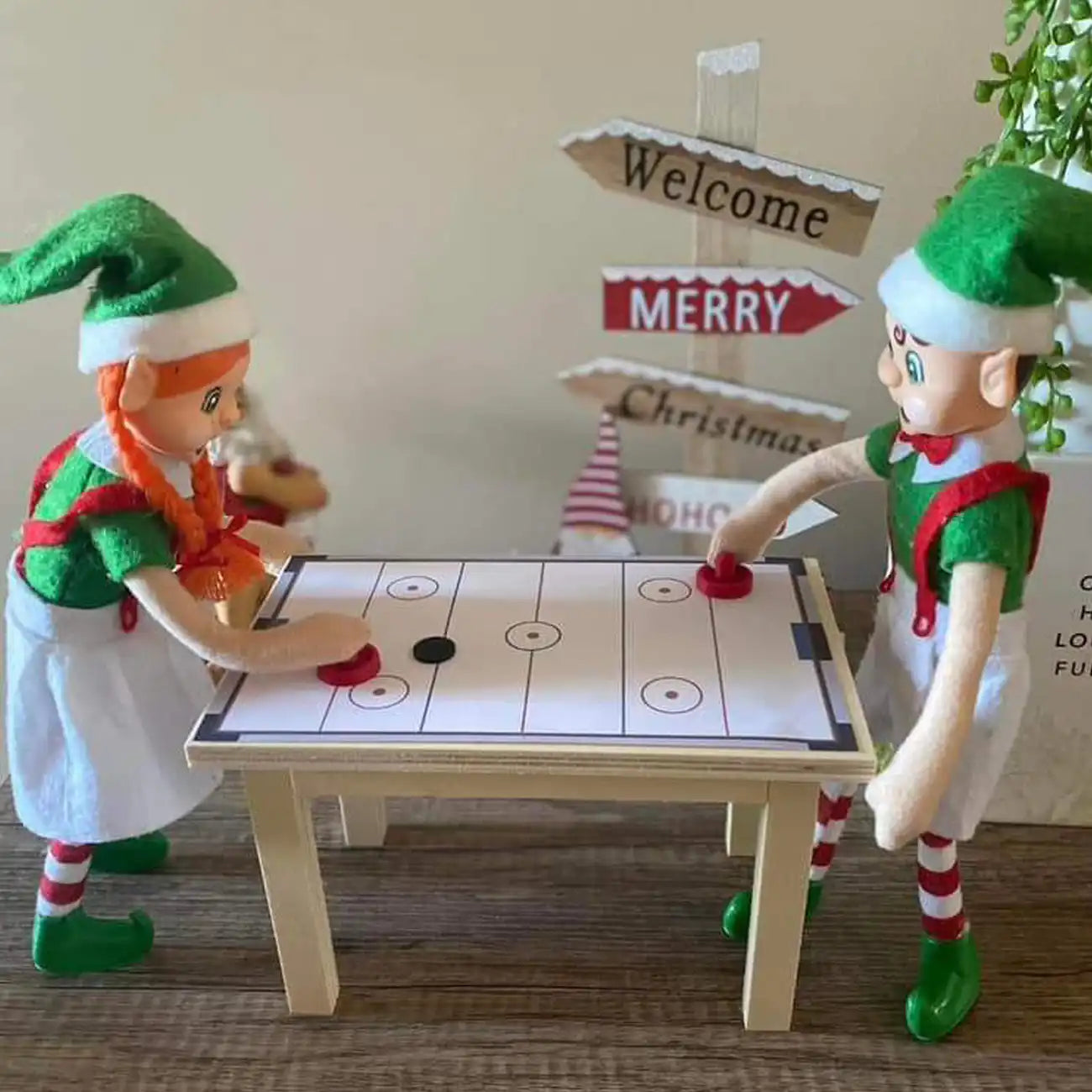 Elf customer air hockey scene