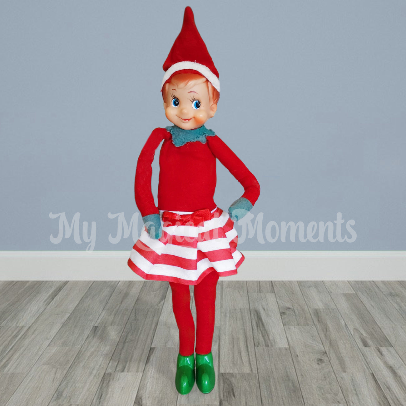 elf wearing a red and white skirt
