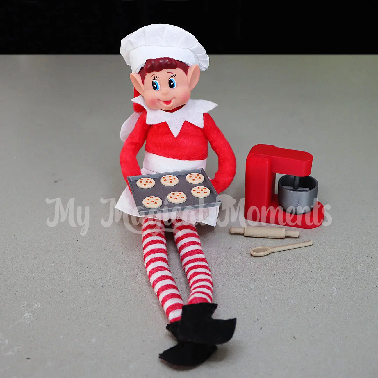 Elf With mini tray of Chocolate chip cookies and baking set with chef outfit