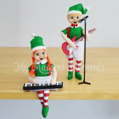 Elves playing with a mini keyboard and mini elf guitar