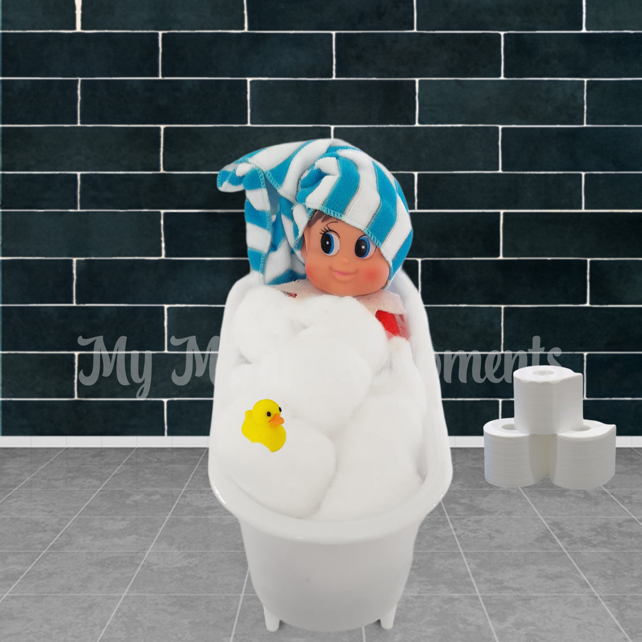 Bathtub prop with elf and rubber ducky, toilet paper. Featuring elves behavin badly elf