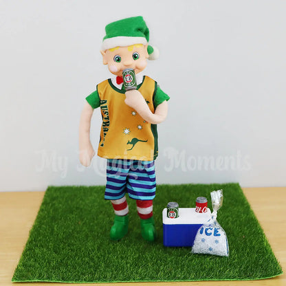 Aussie elf having a beer with an esky at his feet