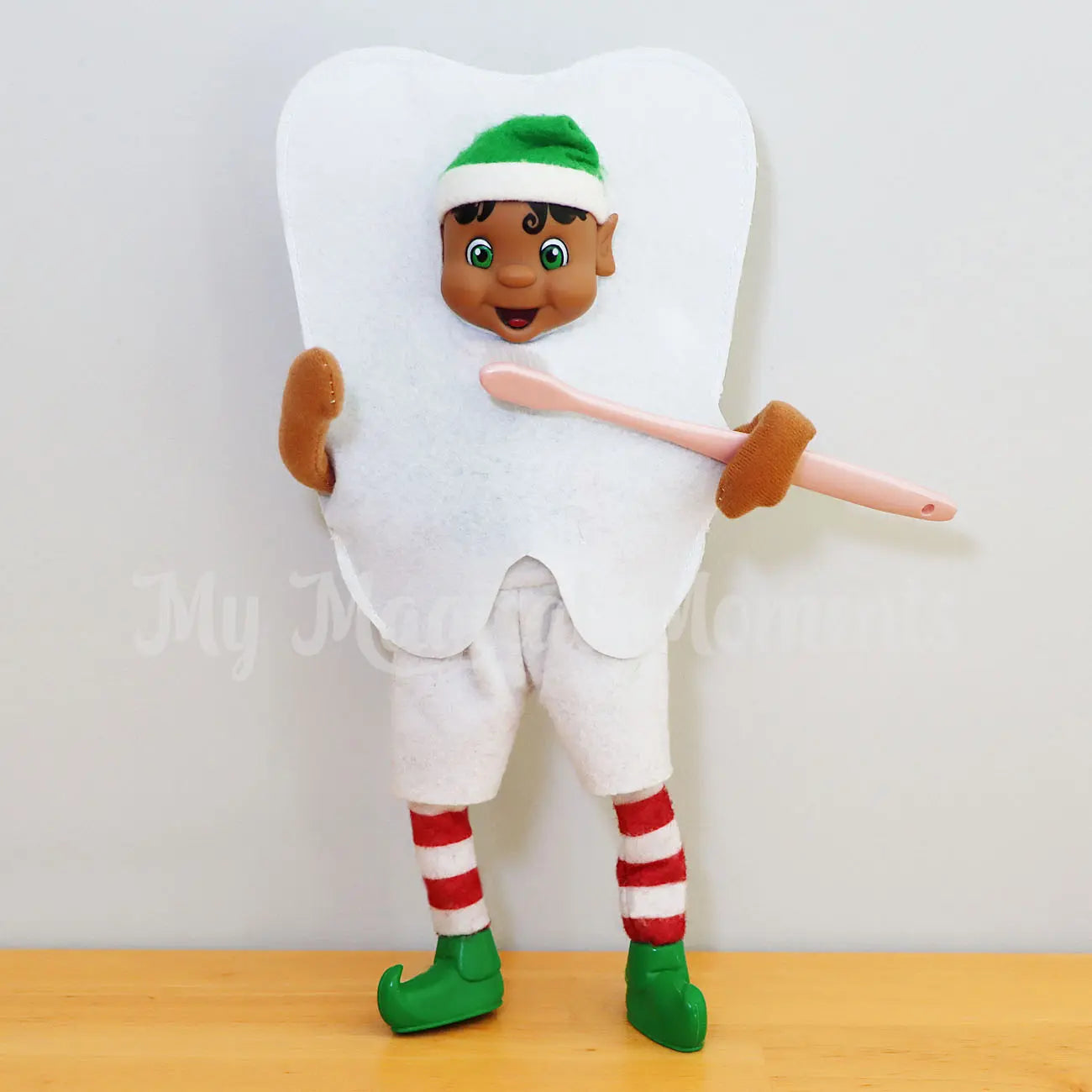 Black Hair Bendable Elf wearing a tooth costume