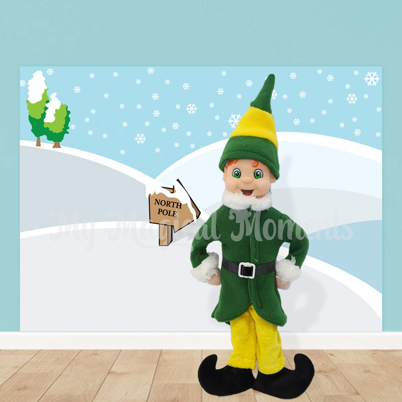 Elf dressed in a buddy the elf costume standing in front of a north pole printable