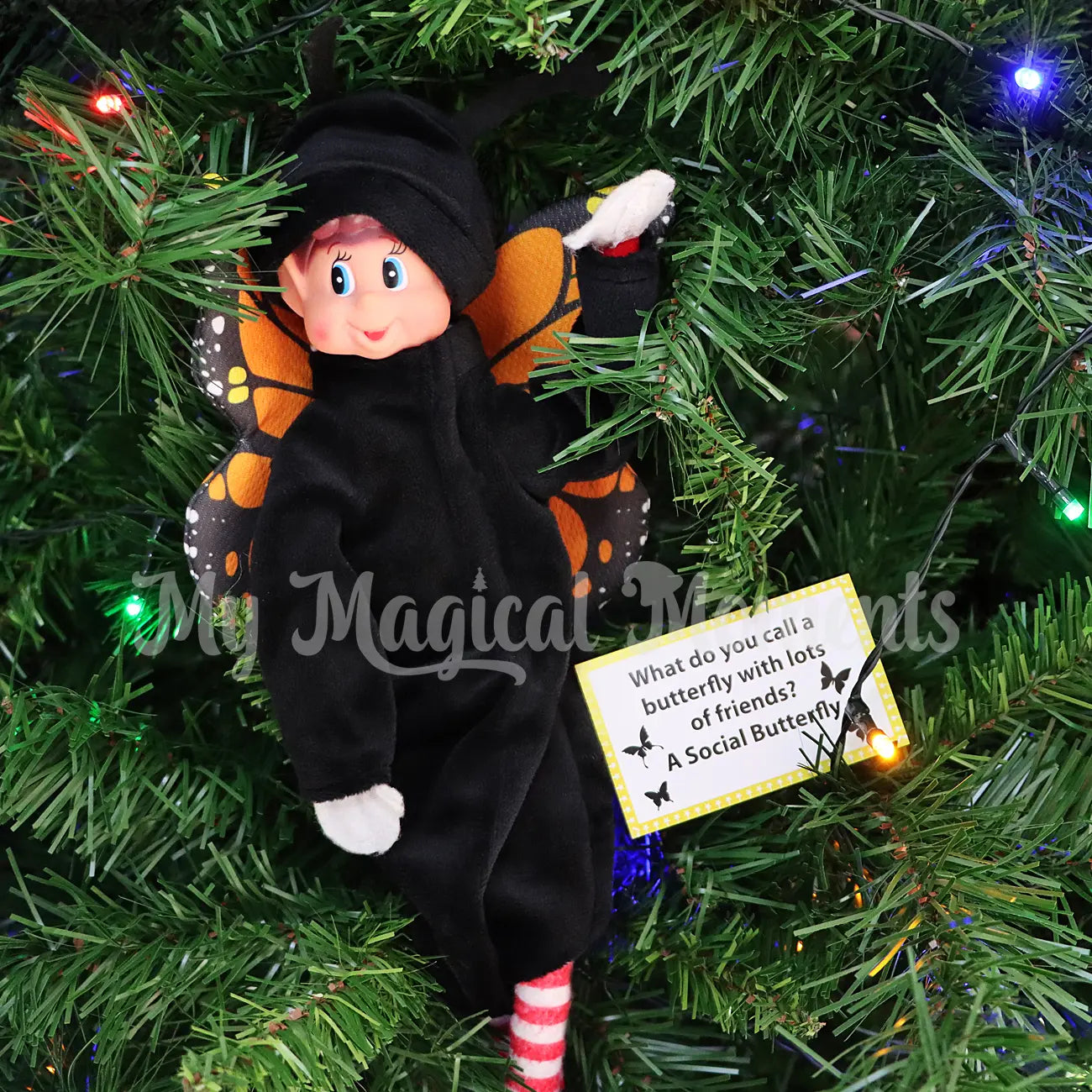 elf wearing a butterfly costume in the Christmas Tree