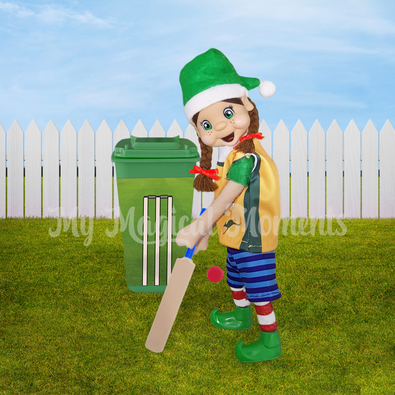 Elf wearing an aussie singlet playing cricket with a wheelie bin