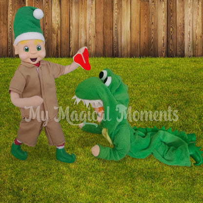 Steve irwn inspired elf dressed as a croc hunter feeding a crocodile elf miniature steak